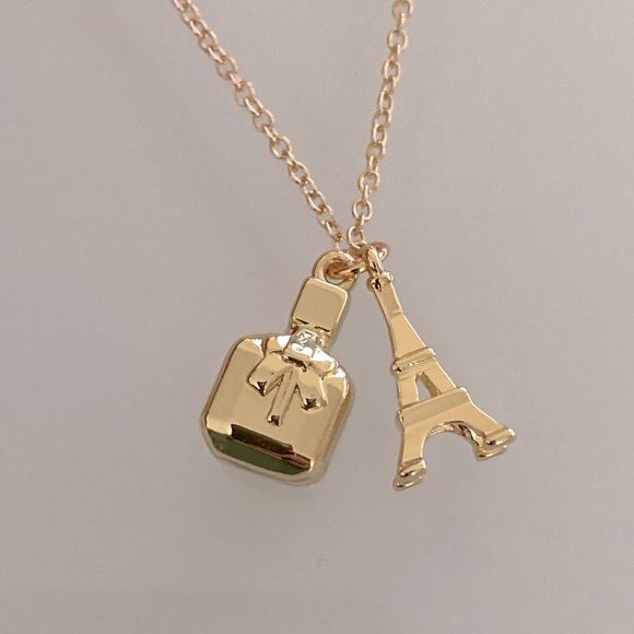Yves Saint Laurent Jewelry - Yves Saint Laurent Gold Eiffel Tower and Perfume Bottle Necklace